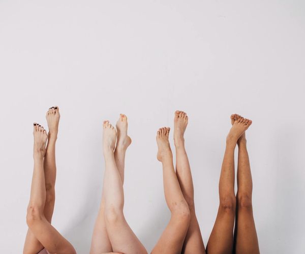 Group of diverse people practicing yoga together.